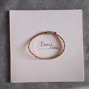Genuine Bryan Adam’s guitar string bracelet